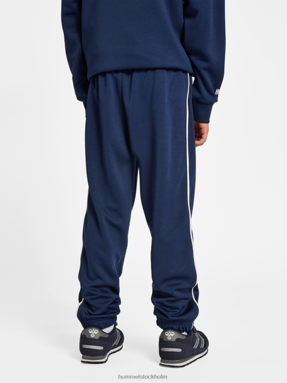 se Hummel barn hmllubago träningsoverall LL40V4686 \"colour-block träningsoverall\"
