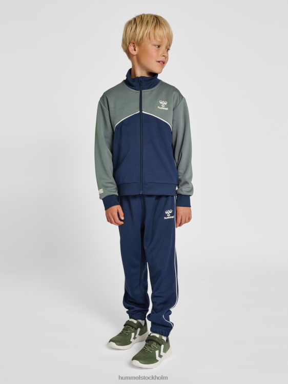 se Hummel barn hmllubago träningsoverall LL40V4742 \"colour-block träningsoverall\"