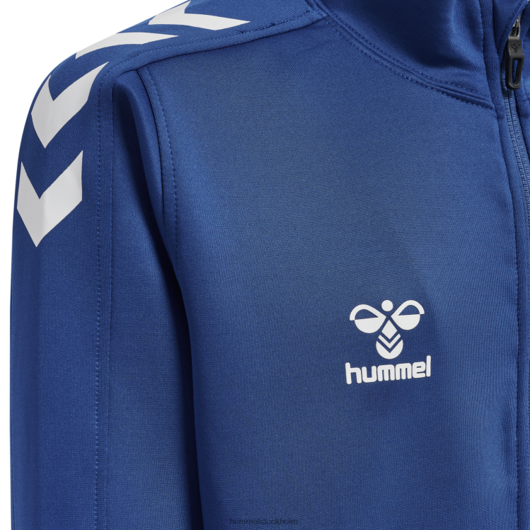 se Hummel barn hmlcore xk poly zip sweat LL40V5953 \"tröja\"