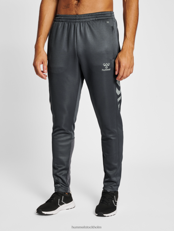 se Hummel unisex- hmlcore xk träningspolybyxor LL40V2083 "träningsbyxor"
