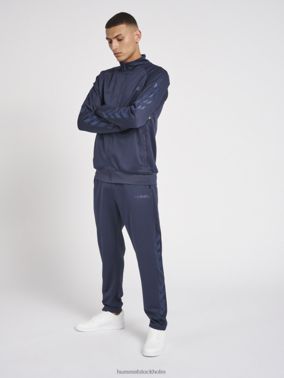 se Hummel unisex- hmllegacy poly avsmalnande byxor LL40V840 \"avsmalnande byxor\"