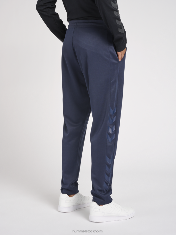 se Hummel unisex- hmllegacy poly avsmalnande byxor LL40V840 \"avsmalnande byxor\"