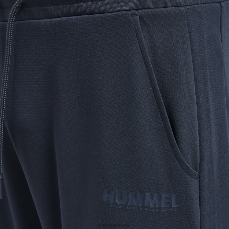 se Hummel unisex- hmllegacy poly avsmalnande byxor LL40V840 \"avsmalnande byxor\"